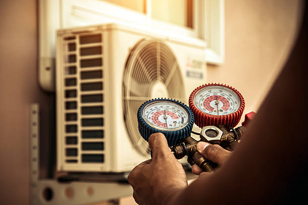 Professional Hvac technician working in California, MD
